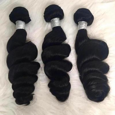 China Cheap Curly Curly Grade 10A Loose Wave Hair Bundles 10 - 30 Inch For Sale 100% Raw Color Women's Brazilian Hair Bundles Wholesale for sale