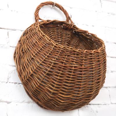 China Plant Fiber Willow Woven Wall Hanging Flower Basket Orchid Potted Flower Arrangement Wall Decoration Rattan Crafts for sale