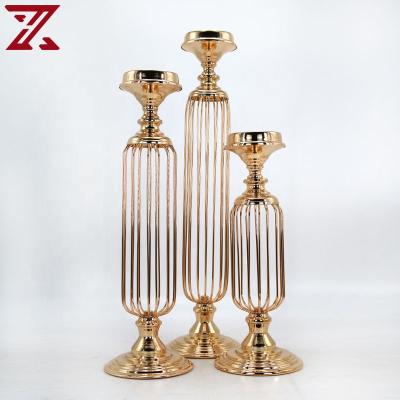 China Home Decoration Low Price Promotion Gold Candle Holder Wrought Iron Round Metal Frame Gold Candle Holder for sale