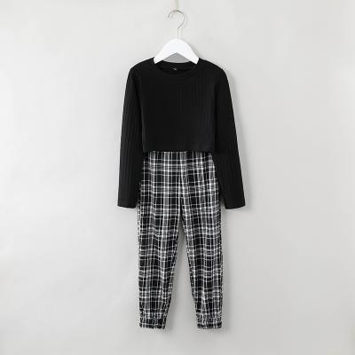 China Anti-wrinkle soft straight black and white girl's wholesale and comfortable custom made plaid legging pants for sale