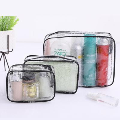 China Fashion bag fashion handbag promotional tpu waterproof makeup cosmetic bag eco-friendly durable cheap pocket transparent for sale