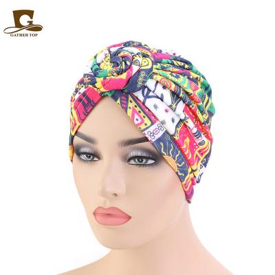 China Plain Dyed Bohemian Swirl Knotted Scarf Fashion African Retro Hat Handmade Pan for sale