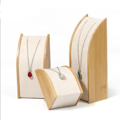 China Eco-friendly Modern Bamboo Wooden Jewelry Display Necklace Raised Counter Jewelry Display Props for sale