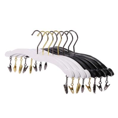 China Eco - Friendly Space Saving Non Slip Pants Hangers Skirt Hangers Pants Hanger With Clips for sale