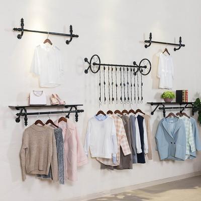 China Modern Customized Clothing Store Wall Display Rack Men's and Women's Children's Clothing Rack for sale