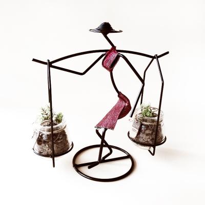 China Eco-friendly Art Women Pudding Glass Jar Handwork Wrought Iron Metal Sculpture Home Decorations for sale