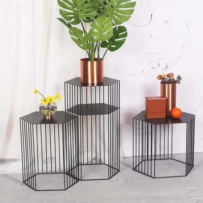 China New Comfortable Living Room Furniture Wire Metal Coffee Table Model Side Cavity for sale