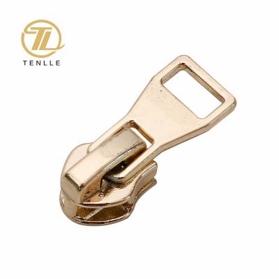 China Nickel Free Handbag Accessory Customized Brand Logo Embossed Puller Made Of Metal Zipper With Slider For Bags / Apparel for sale