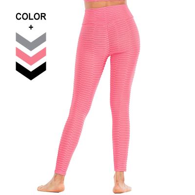 China Breathable Woman Workout Leggings Butt Crac! crack! Front Cross Pants Bubble Textured Yoga Leggings for sale