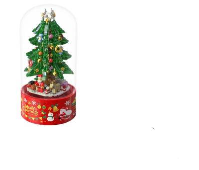 China Construction Toy 629Pcs Christmas Tree Rotating Drifting Snow Music Box Model Building Blocks Children DIY New Year with Figure Bricks for sale