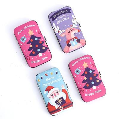 China Easy Carry 2022 Hot Selling New Amazon Cartoon Cute Christmas Pattern Nail Clipper Set for sale