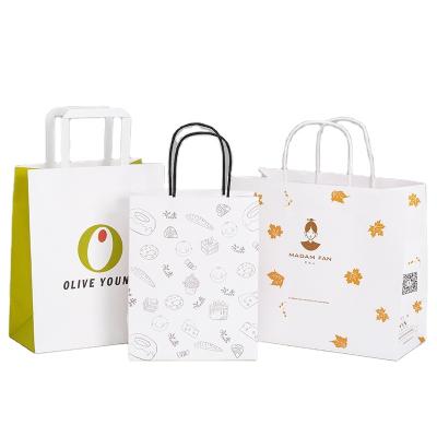 China Recycled Materials Advertising handbag custom clothing shopping gift packaging cosmetics wine bags custom printed LOGO for sale