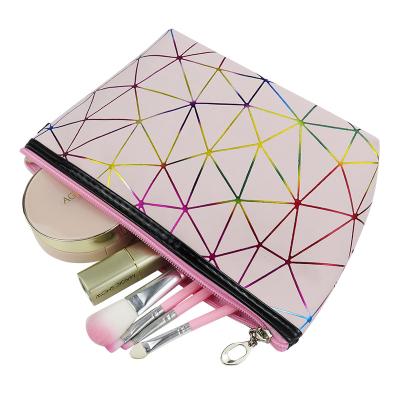 China Custom Made Eco High Quality Pink Geometric PVC Logo Makeup Bag For Ladies for sale