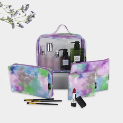 China Recyclable 4 in 1 Cosmetic Toiletries Bag Set Purple Cloud Tie Makeup Bag For Travel Tinting Organizer for sale