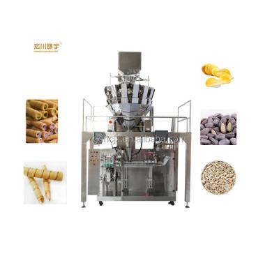 China Hot sale food premade full automatic horizontal bag loose weighed and stuffed loose packing machine for dried fruits in our factory for sale