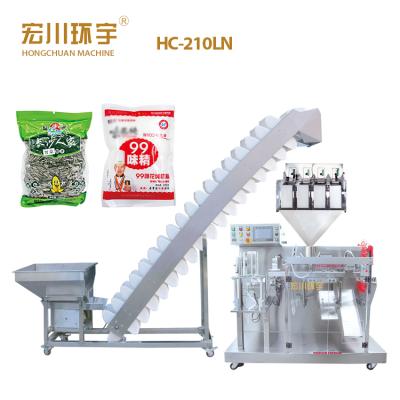 China Hot Sale Food Peanuts Macadamia Nuts Premade Bag Wrapping Seal Packing Machine with China Multi Head Weigher for sale