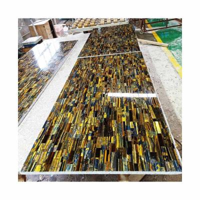 China Luxury Stone Tiger Eye Monzonite Composite Slab For Wall Decoration for sale