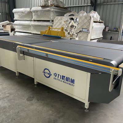 China High Speed Computerized Automatic Flipping Mattress Tape Edge Machine For Mattress 50-500mm Sewing Thickness for sale