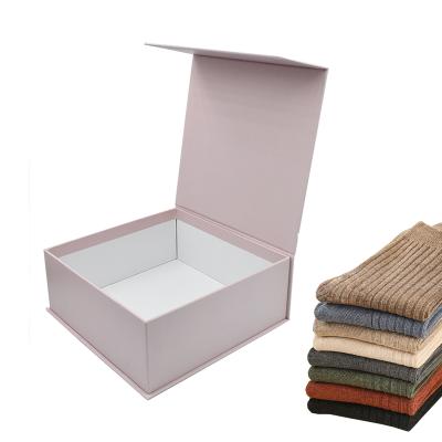 China Recyclable Book Shape Hat Box Packaging With Magnet Cardboard Gift Box With Grain Pressing for sale