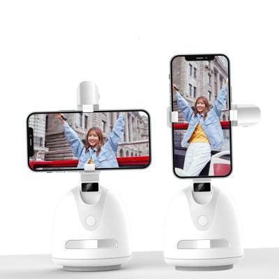 China Hot Adjustable In Vlog Auto Shooting And Live Streaming 360 Face Tracking Mobile Smart Phone Holder With Tracking Camera for sale