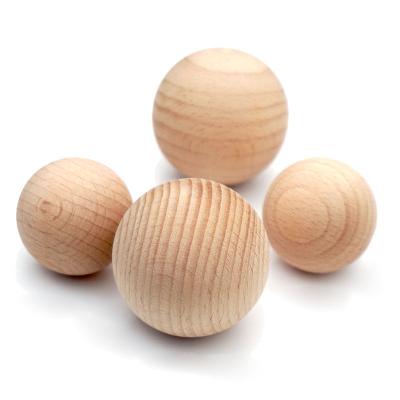 China Montessori educational unfinished unpainted diy wooden balls round ball toy craft wooden art from Europe for sale