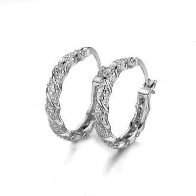 China TRENDY big zircon diamond twisted huggie women's large rhinestone cz circle earrings crystal hoop earrings jewelry for sale