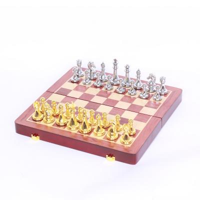 China Eco-friendly travel vintage DGT international schach chess board eco-friendly material folding wooden staunton board game set luxury metal chess pieces for sale