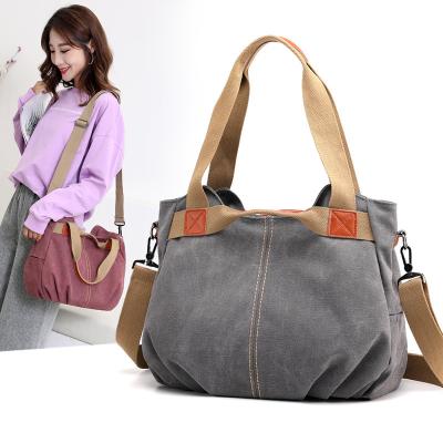 China Waterproof Manufacturers Wholesale New Korean Shoulder Bags Women's Hand Messenger Bag Large Capacity Casual Canvas Bag for sale