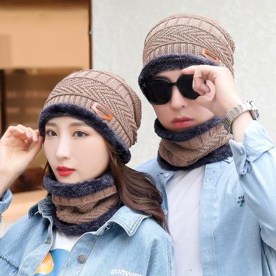 China Young warm soft and thick wool knitted satin striped down the cold autumn winter cotton hat collar ear cap beanie for sale