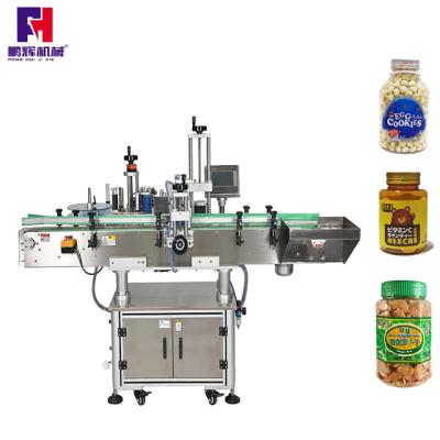 China Penghui factory high quality automatic round bottle labeling machine food plastic bottle glass cup labeling single and double sides for sale