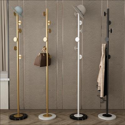 China Metal iron bedroom metal clothes hanger rack women boutique modern Nordic light luxury home racks disply for sale