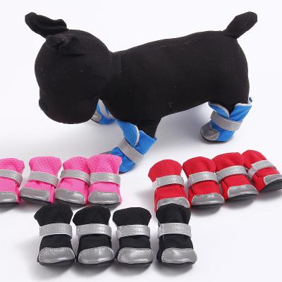 China Stocked Custom Wholesale Pet Supplies Pet Shoes Reflective Soft Breathable Unique Dog Shoes for sale