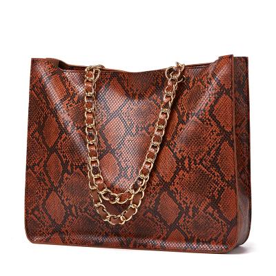 China Luxury Waterproof Woman Snakeskin PU Bags 2021 Design Quality Unique Woman Guaranteed Tote Bag Large Capacity Handbags for sale