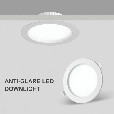 China Modern IP45 18w 24w Trade Show Recessed White Round Flat Led Panel Lights for sale