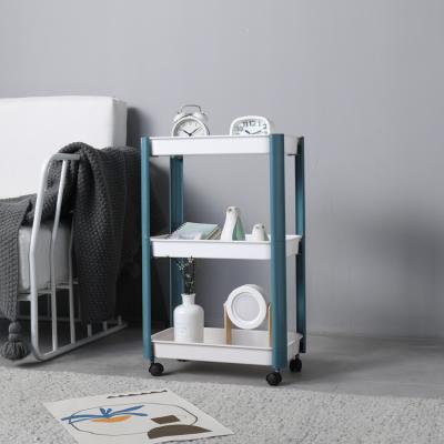 China Sustainable 3 Tier Multifunctional Corner Plastic Bathroom Kitchen Storage Shelf With Wheels for sale