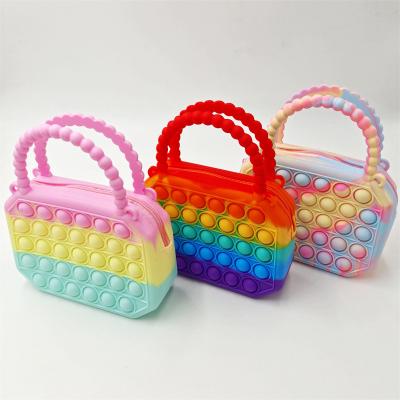 China Busy person toys push new arrivals dropshipping bubble sensory fidgety person toy puzzle cube handbag rainbow fidgety person purse bag for sale