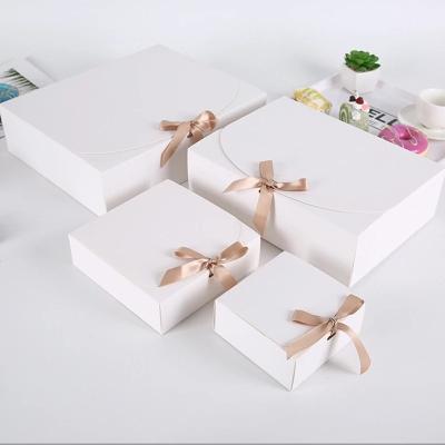 China Recycled materials custom date white hard paper box luxury dessert packaging boxes with logo for Saudi market for sale