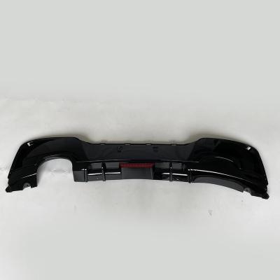 China Car Rear Bumper PP Plastic Material Rear Diffuser With Lights For 1 Series F20 BMW 2012-214 for sale