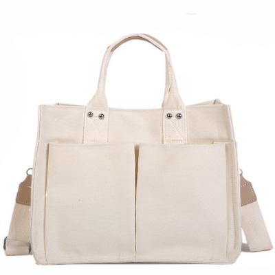 China Wholesale Fashion Women Multi Pockets Handbag Empty Canvas Tote Bag With Detachable Shoulder Strap for sale