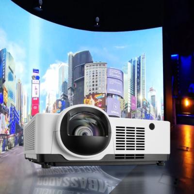 China Projeção imersiva grande 6000 Lumen LCD Projector curto lançamento com 30000 horas Laser Ultra longa vida útil à venda