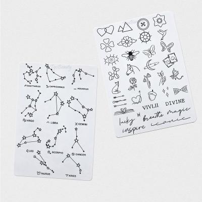 China More designs including words Private Label 1.5mm Tiny Tattoo Training Pad White Silicone Tattoo Practice Skin with Double Sides Pre-printed Designs for sale