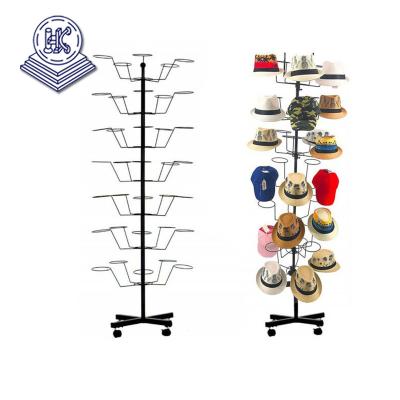 China Easy Assembly Rotating Free Standing Hat Display Rack Metal Floor Sheets Headwear Rack 7 Tier for sale