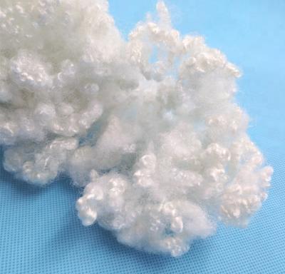 China Anti-pilling semi virgin cavity grade A conjugated siliconized fiber HCS / hcs polyester staple fiber for sale