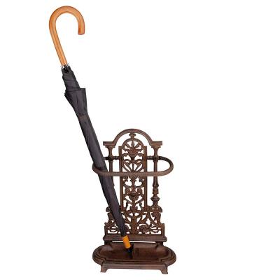 China Indoor Umbrella Holder Rust Rack Umbrella Storage Rack Cast Iron Retro Umbrella Base Holder Recyclable Antique Dry Umbrella Stand for sale