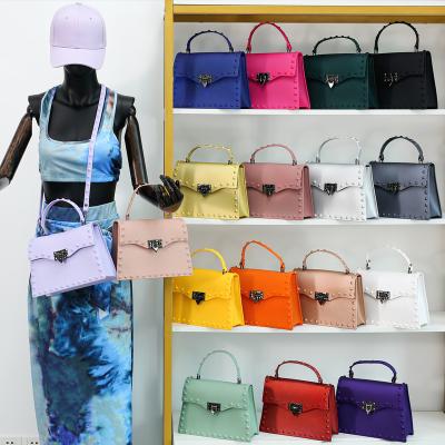 China PORTABLE 2022 new arrivals trending products fashion handbags rivet Jelly Bag Designer Luxury Purses and handbags for women handbags for sale