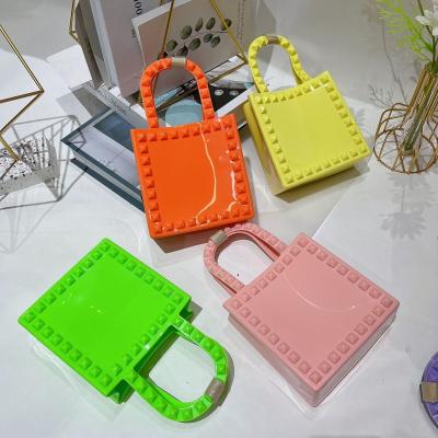 China Fashion 2022 Fashion Mini Tote Bag Pvc Rivet Bag Mini Purses Small Jelly Designer Clips Women Brand Purses and Famous Handbags Ladies for sale