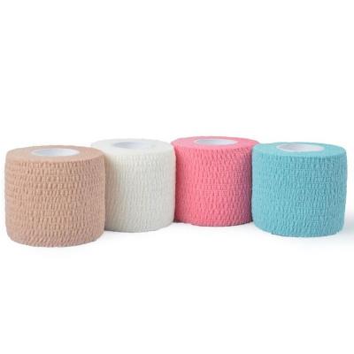 China Tensoplast Multicolor High Quality Cotton Stretch Cover-Roll Self Adhesive Sports Waterpoof Bandage for sale