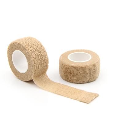 China Sport 2.5cm *6.9m Waterpoof Self Adhesive Cotton Tensoplast Stretch Multicolor High Quality Bandage for sale