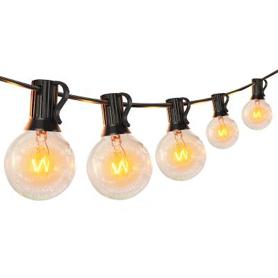 China Outdoor Decorative Waterproof High Voltage Edison Retro Warm Light Tungsten Glass Bulb String Lights LANDSCAPE G40 LED String Lights for sale