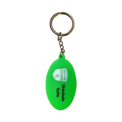 China Promotional Rubber Gifts Custom Screen Printed Hologram Shining Charm Iridescent Eye Logo Color Tags PVC Keychains for sale